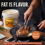 Cook searing a steak in a cast iron skillet beside a jar of Farmer Bob's high smoke point beef tallow