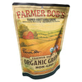 Angled Farmer Bob's organic spelt bag showing the farm landscape label